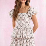 Cream and Black Ribbon Printed Double Bubble Hem Mini Dress