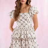 Cream and Black Ribbon Printed Double Bubble Hem Mini Dress