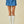 Denim Pleated Mini Skort W/ Pocket Flaps And Ties