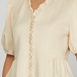 The Timeless Cream Peplum Top