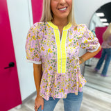 The Buttercup Bloom Peplum Top