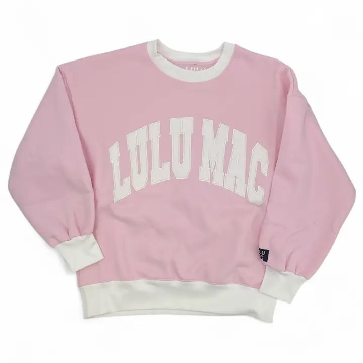 Pink sweatshirt with 'LULU MAC' text on a white background