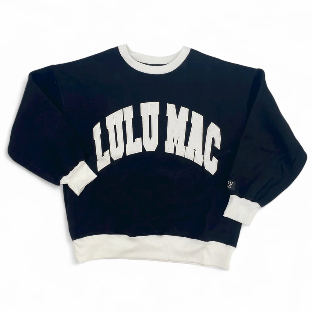 Navy blue sweatshirt with 'Lulu Mac' text on a white background