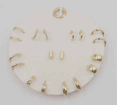 Set of 9 Geometric Stud and Hoop Sets on a Leather Circle Display, Best Seller!