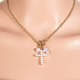 Pearl And Pearl Studded Cross Charms Necklace